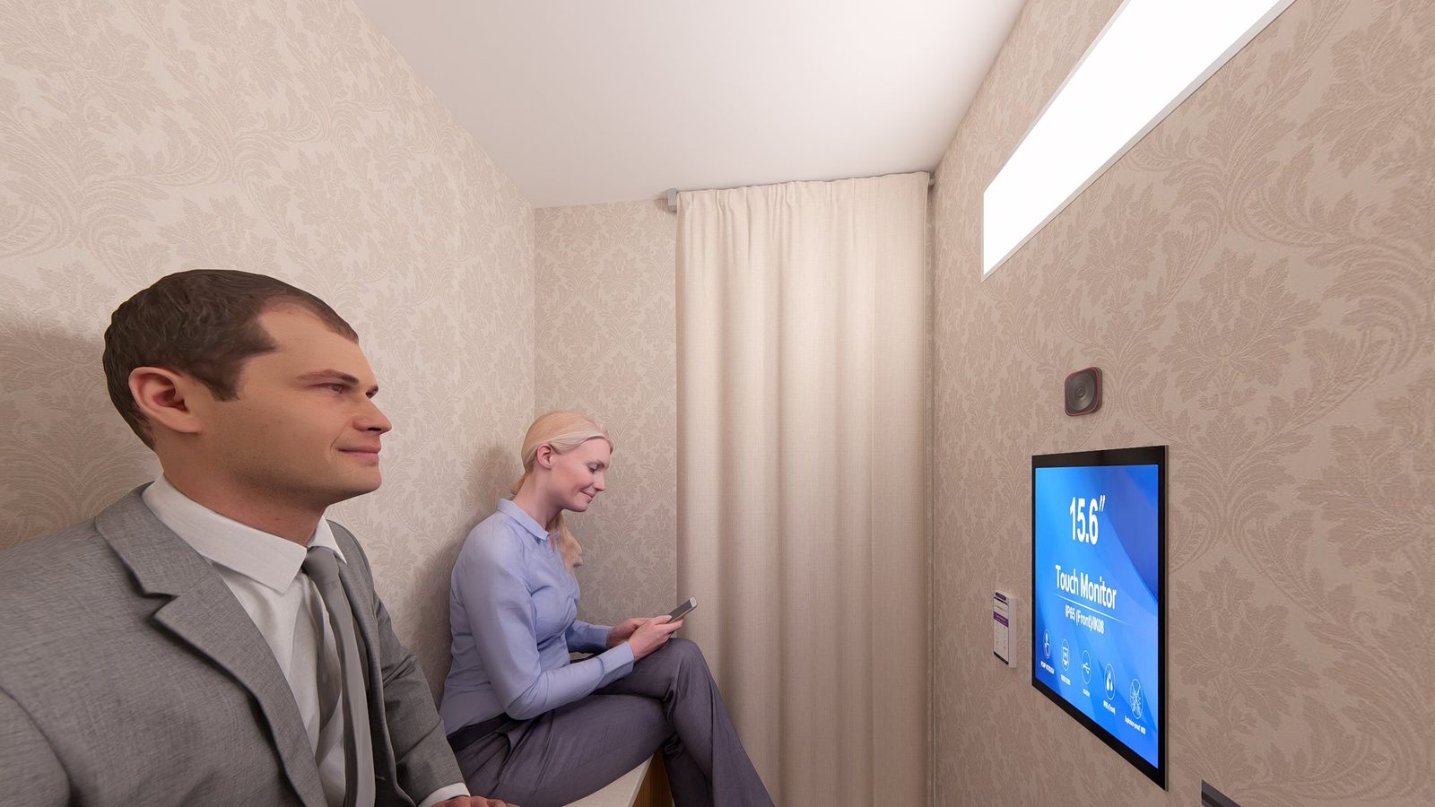 Two guests on the bench inside the Laqta booth, facing the touch screen